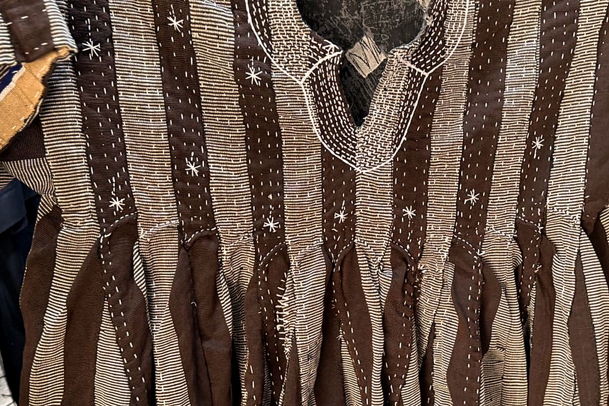 Chocolate-and-cream narrow-strip stripe with white star embroidery on a hand-woven Taupe fugu smock